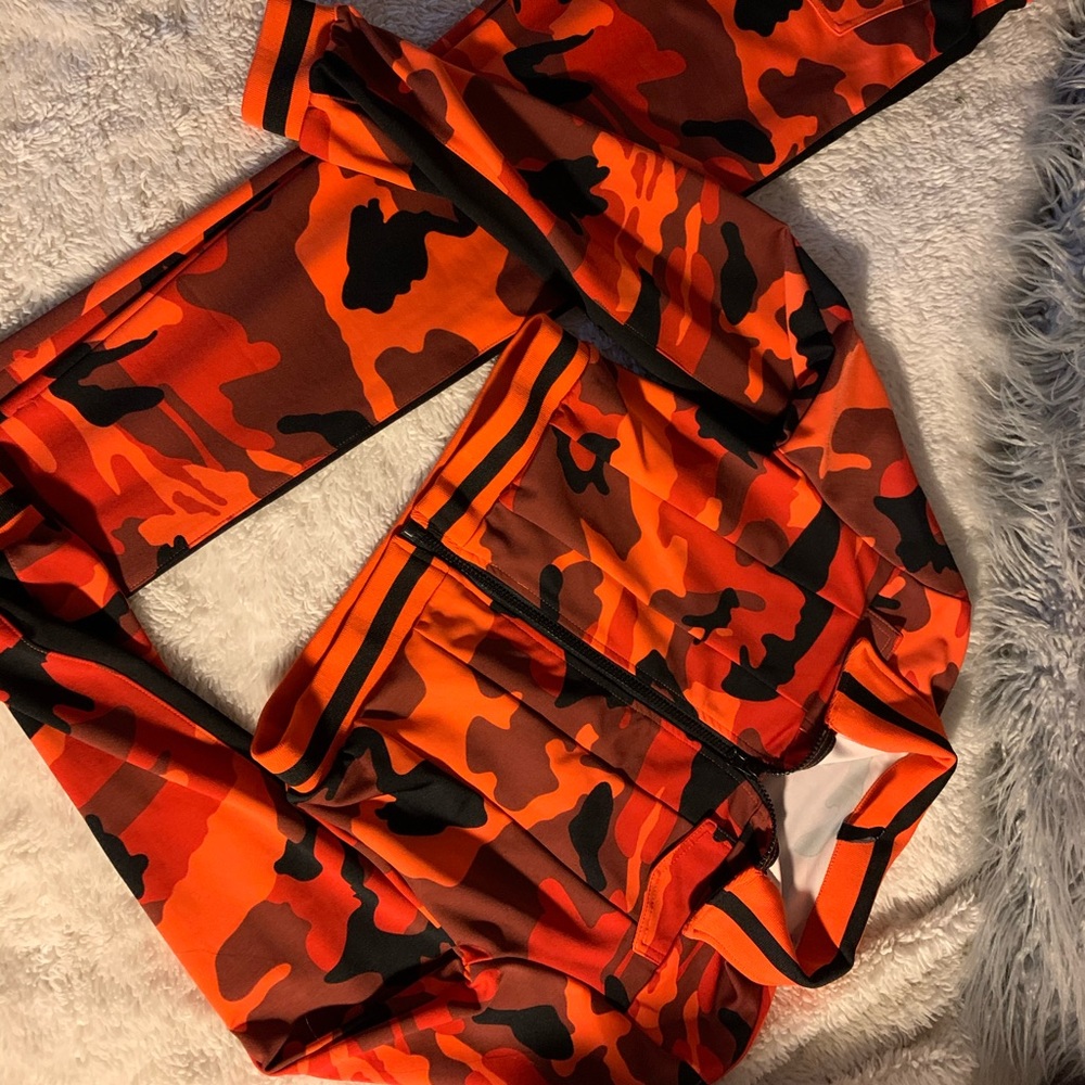 Orange and black jump suit